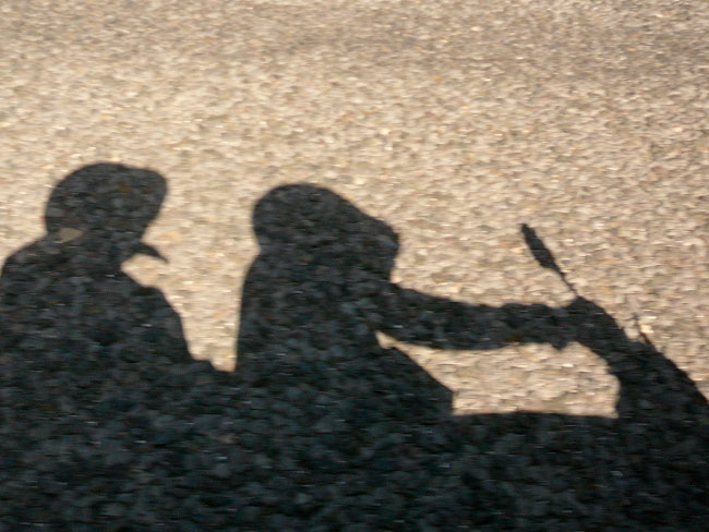 Scooter Boy And Scooter Girl In Shadow Scooter Boy And Scooter Girl In Shadow