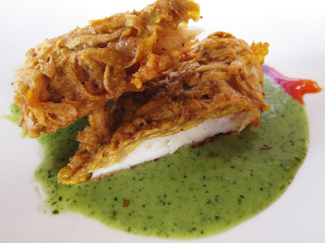 Plantain encrusted halibut with cilantro cream at Crispy y Relleno in Pinones, Puerto Rico