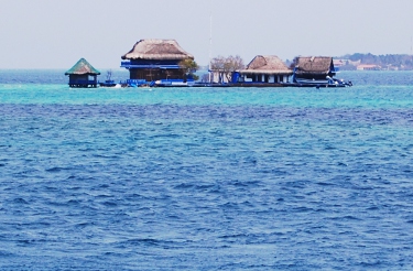 Island huts on our way to Playa Blanca, Colombia Island huts on our way to Playa Blanca, Colombia